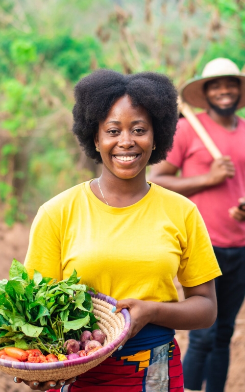 Portrait,Of,A,Beautiful,Female,African,Farmer,Carrying,Basket,Of